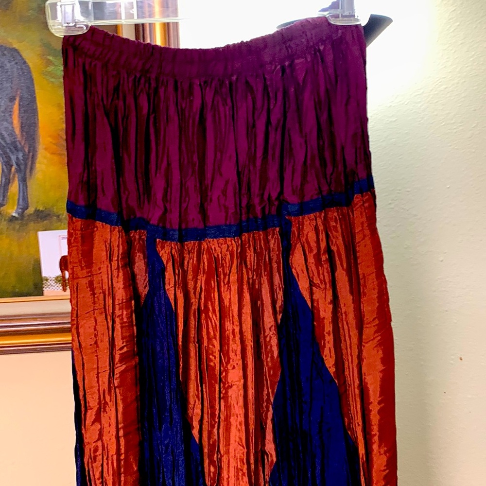Long skirt Size small, navy blue , purple and rust with Elastic waist